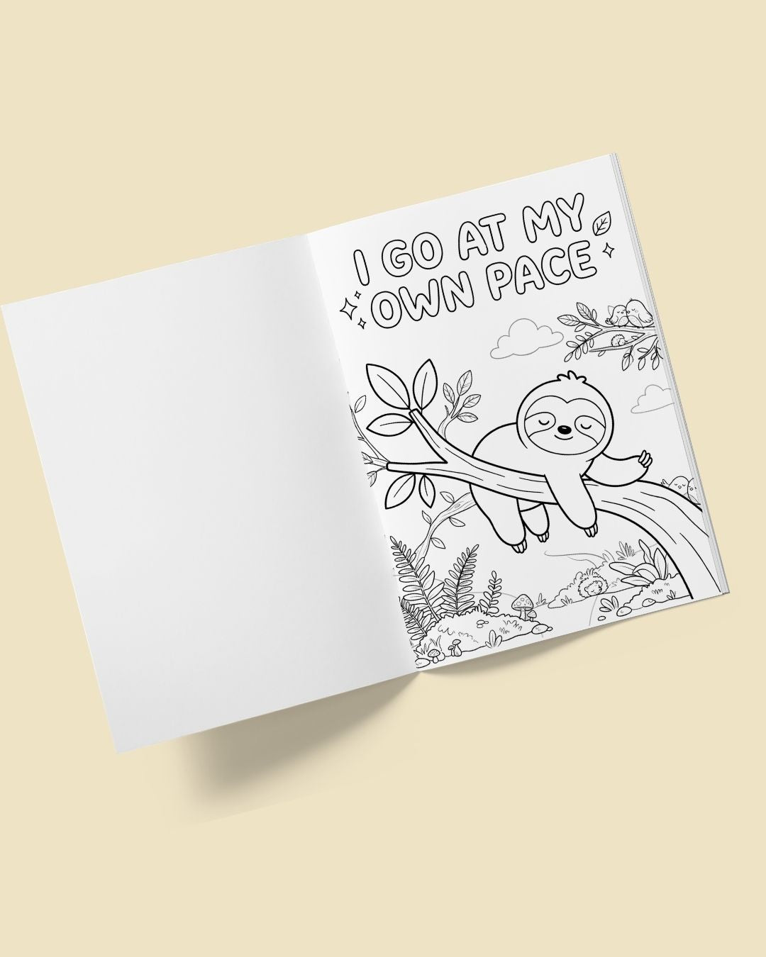 Open Animal Kingdom colouring book with a blank page beside an I go at my own pace colouring page of a sleeping sloth