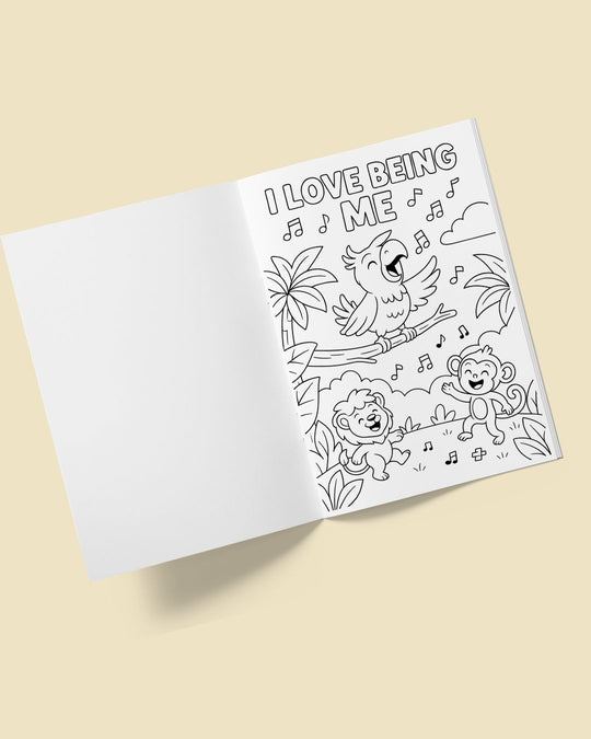 Open Bite-Sized colouring book with a blank page beside an I love being me colouring page of a parrot, lion and monkey dancing