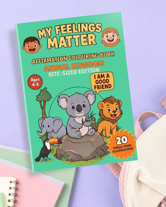 My Feelings Matter Bite-Sized colouring book on a lavender background with a pink notebook and a cream backpack